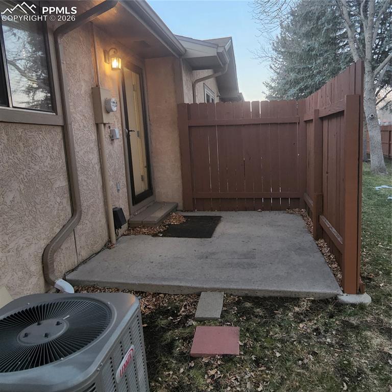 Image 21 of 23: With A/C unit and rear porch