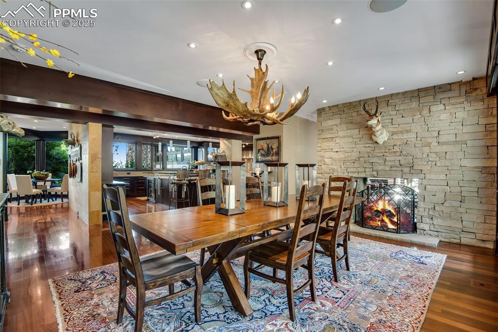 Image 13 of 38: A grand formal dining room is easily accessible from the kitchen. Large win