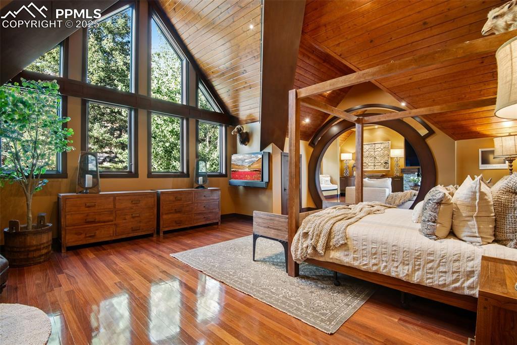 Image 15 of 38: Primary bedroom expands the entire East side of this custom built estate	