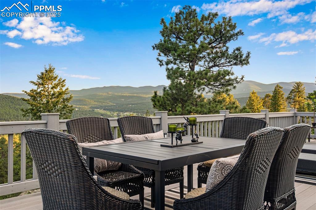 Image 28 of 38: Plenty of sitting areas and decks adorn various rooms of this 30-acre estat