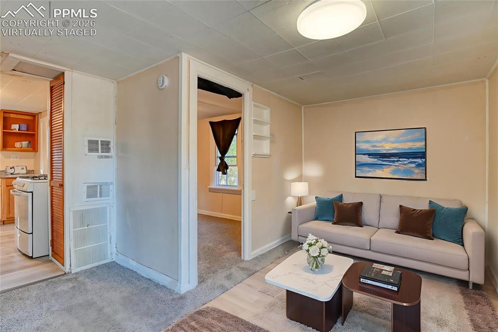 Image 23 of 30: Virtually Staged Cottage Living Room
