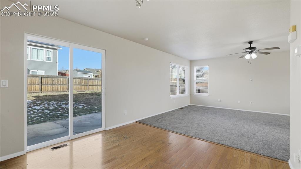 Image 17 of 45: View into the Living Room from the Dining Area.