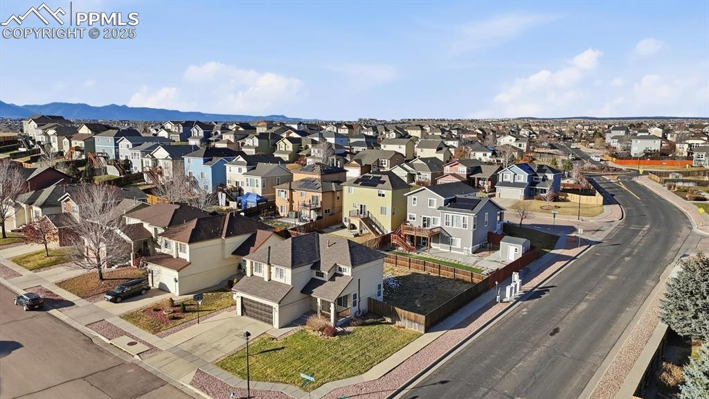 Image 3 of 45: Aerial view of home and corner lot.
