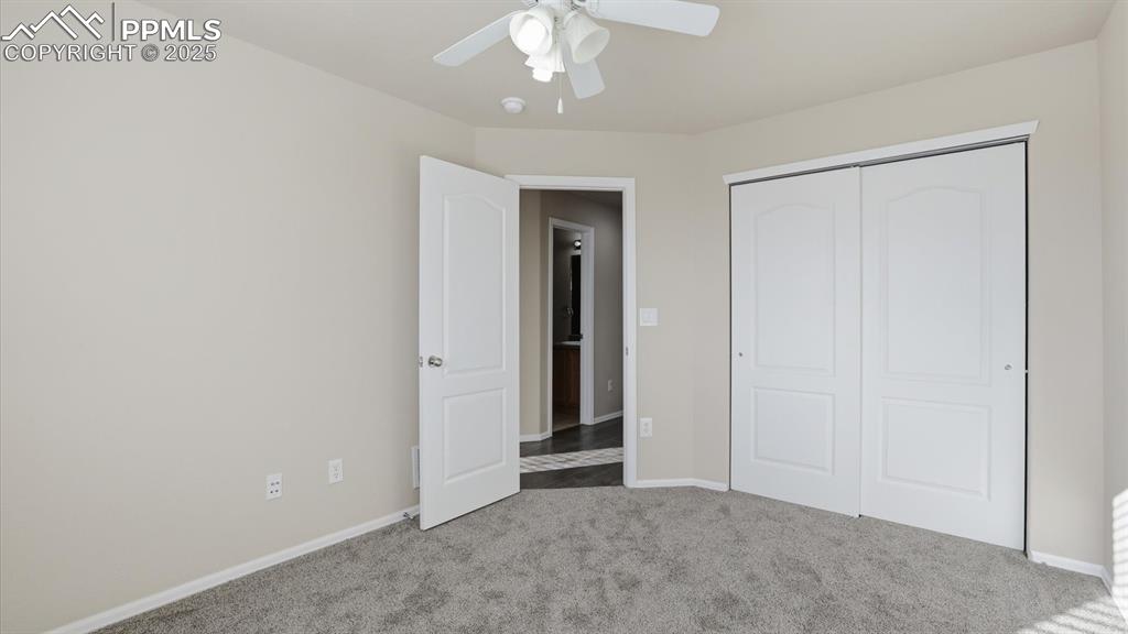 Image 30 of 45: Upper Level Bedroom #4 has a generous closet.