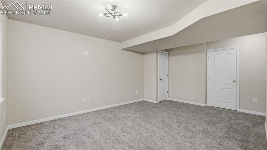 Image 34 of 45: The Finished Basement offers flexible, expanded living space to provide for