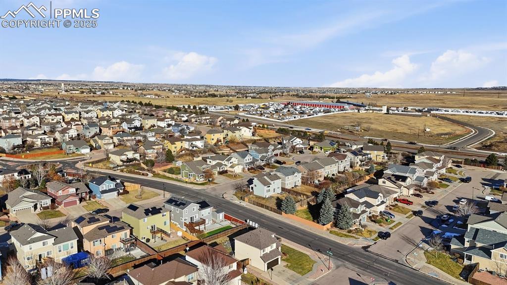 Image 44 of 45: Aerial view of home and neighborhood.