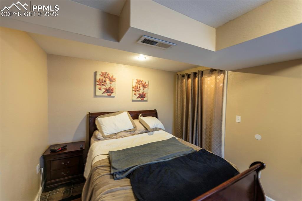 Image 40 of 50: Bedroom