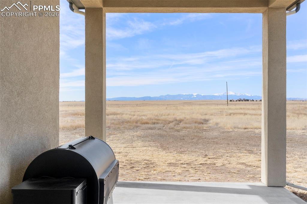 Image 11 of 50: 12x15 covered patio with Front Range views