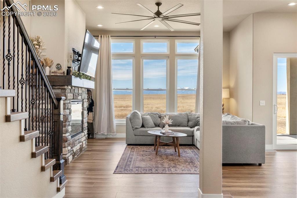 Image 12 of 50: Mountain views framed by floor to ceiling windows 