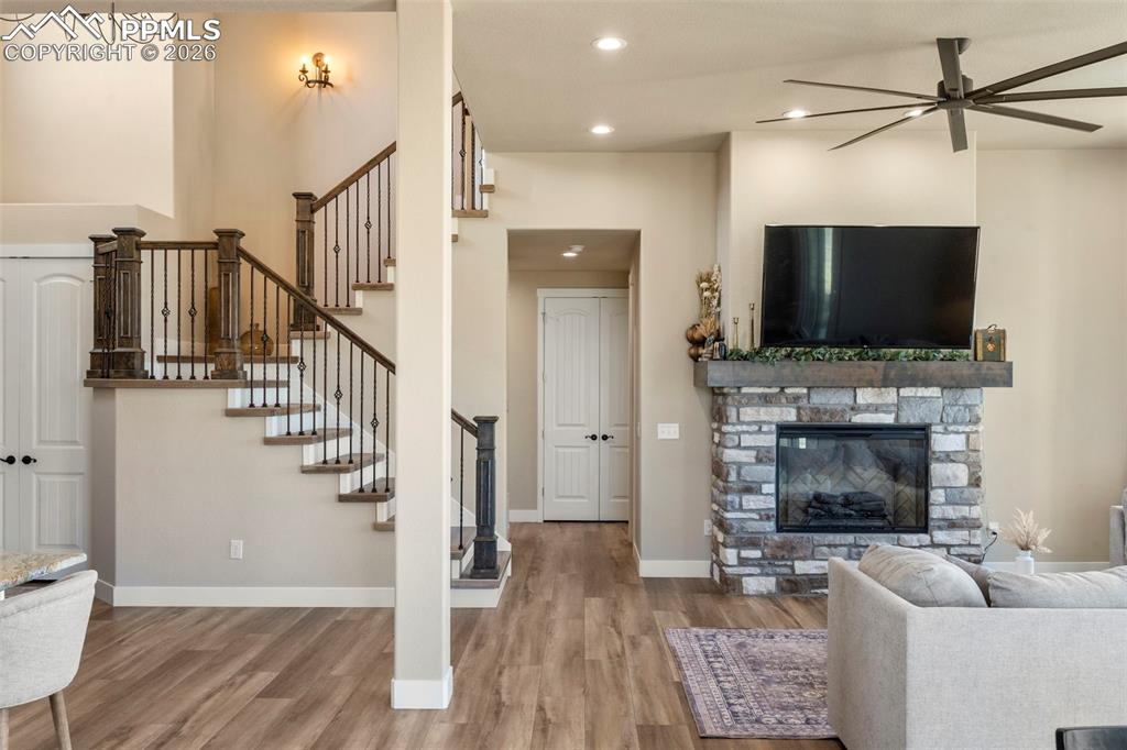 Image 15 of 50: Beautiful upgraded staircase railing and luxury vinyl treads