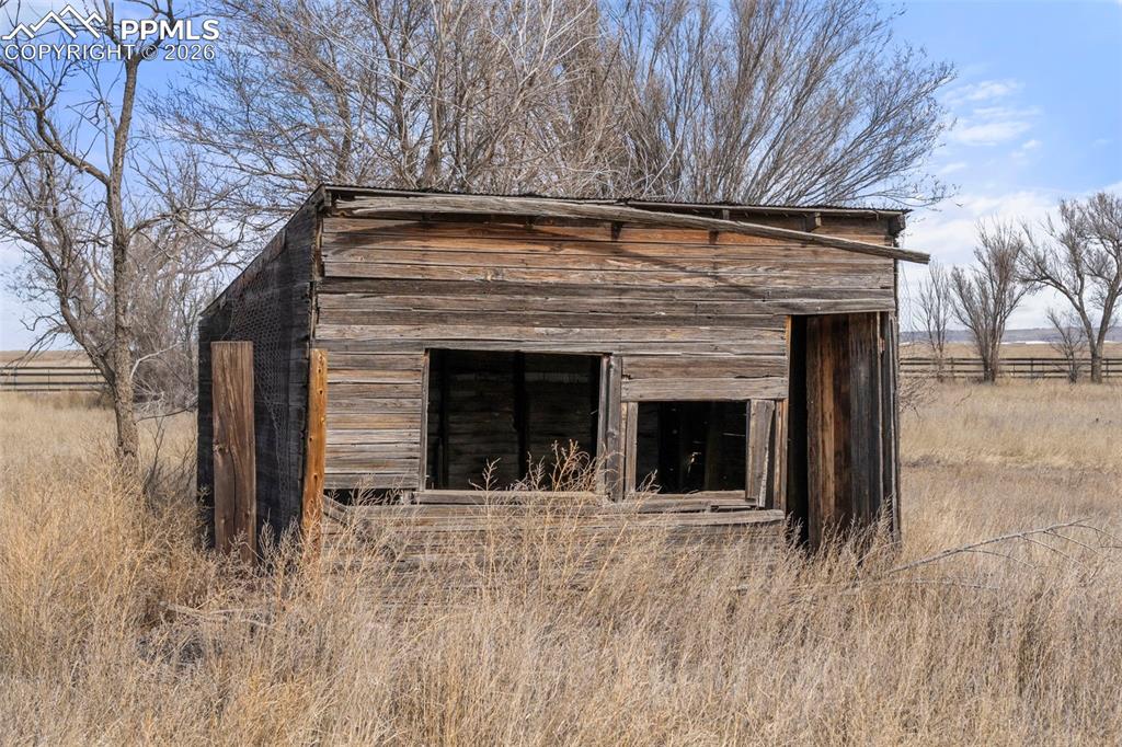 Image 36 of 50: Rustic chicken coop