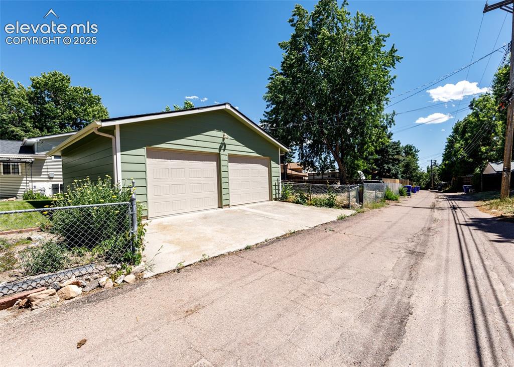 Image 40 of 45: detached garage & alley