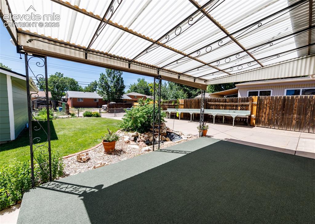 Image 43 of 45: Covered patio
