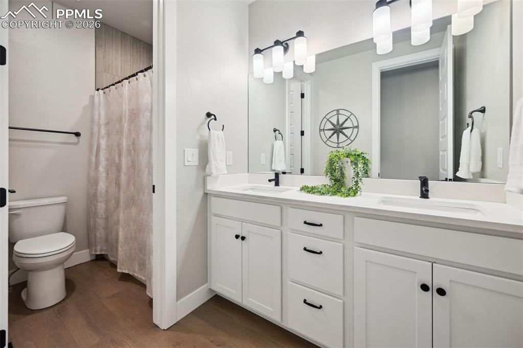 Image 19 of 43: Main level secondary bathroom