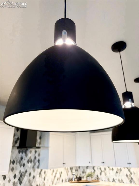 Image 35 of 43: Over island lighting