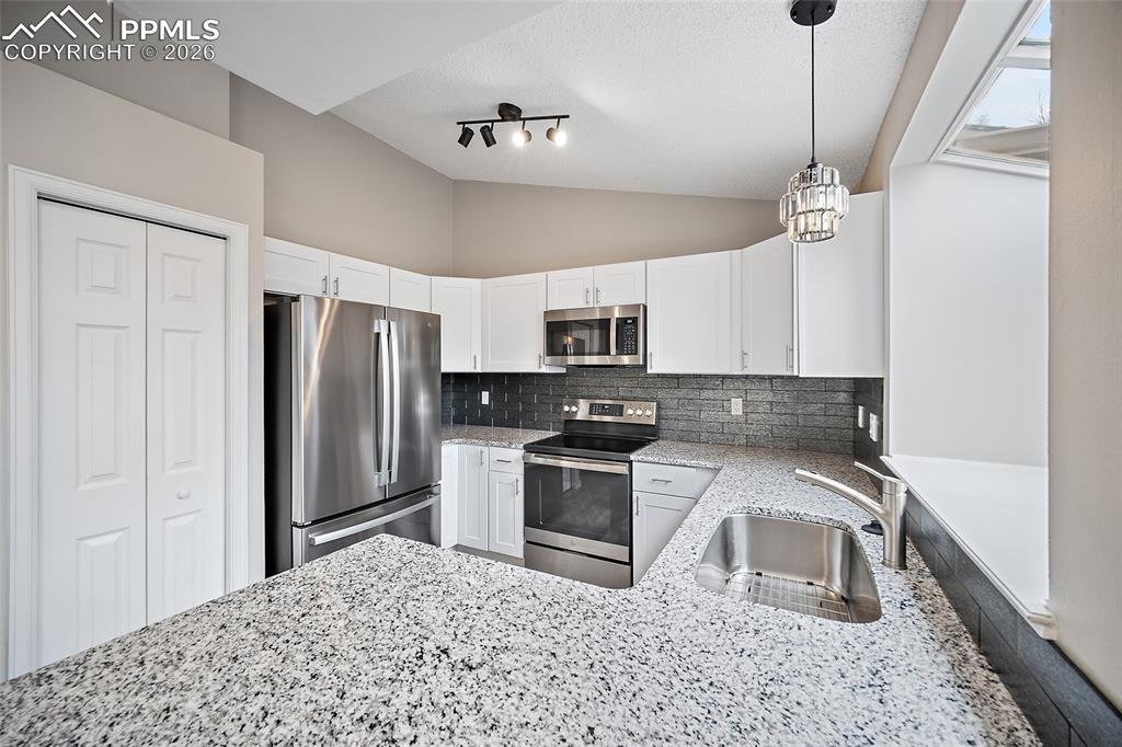 Image 12 of 38: Kitchen