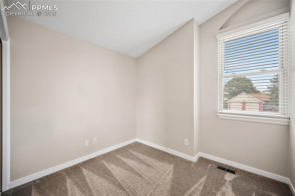 Image 30 of 38: Bedroom