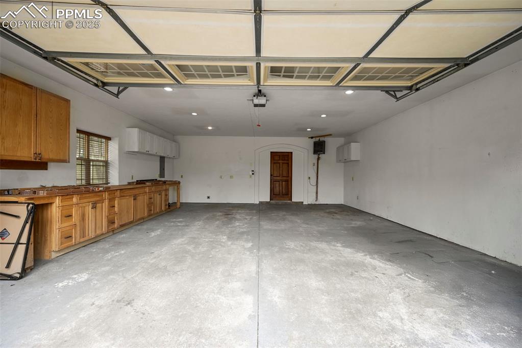 Image 35 of 43: 2 car oversized heated garage 