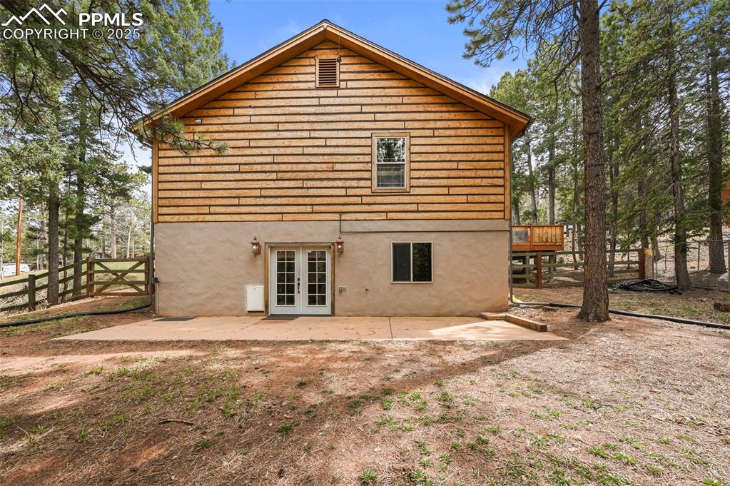 Image 40 of 43: Lower level walk out patio