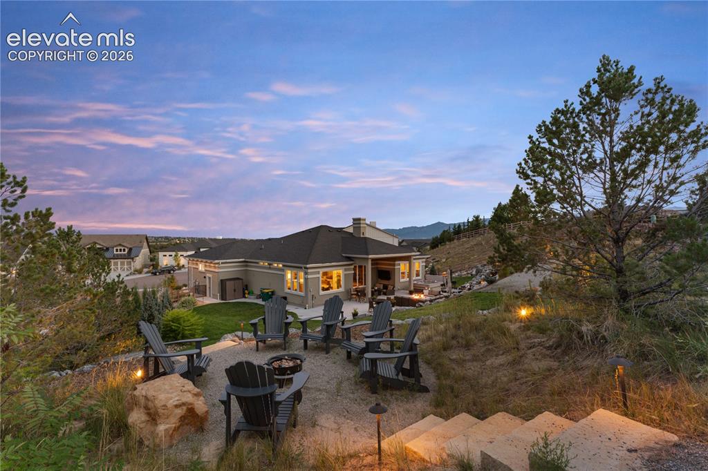 Image 4 of 45: Mountain views from the upper level patio seating area.