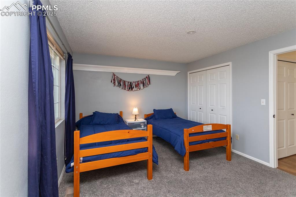 Image 29 of 50: Bedroom