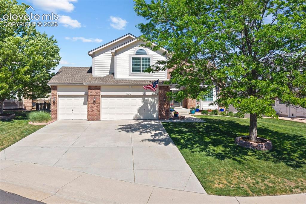 Image 1 of 50: Two-story residence featuring a 3-car garage, brick accents, siding exterio
