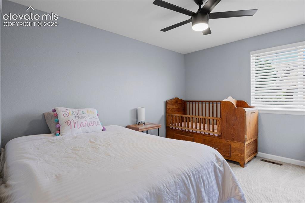 Image 32 of 50: Upstairs bedroom