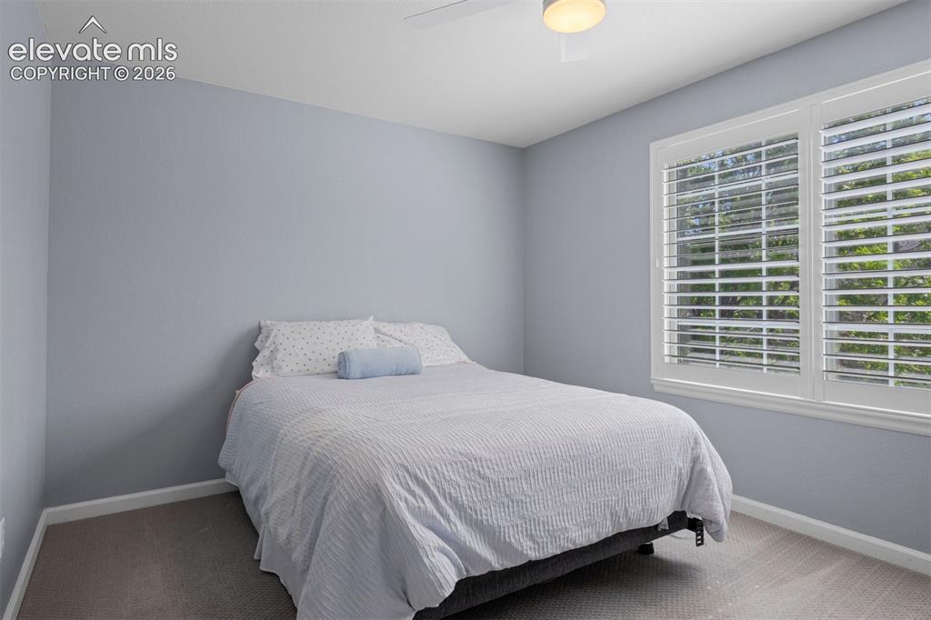 Image 34 of 50: Upstairs bedroom.