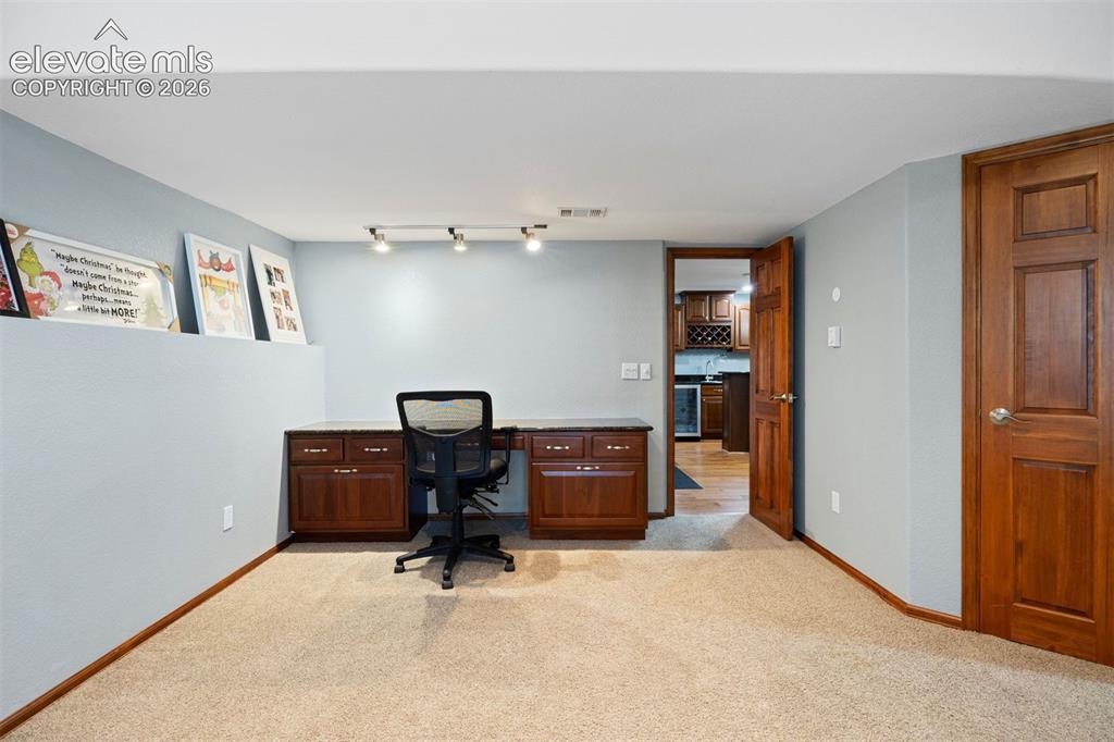 Image 44 of 50: Basement bedroom