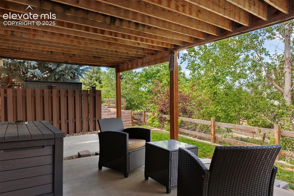 Image 45 of 50: Back patio. There is also a hot-tub pad.