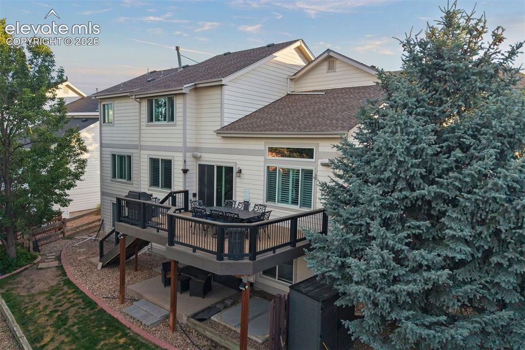 Image 47 of 50: Walk-out basement. Hot-tub pad. Back patio, Composite deck and fenced in ya