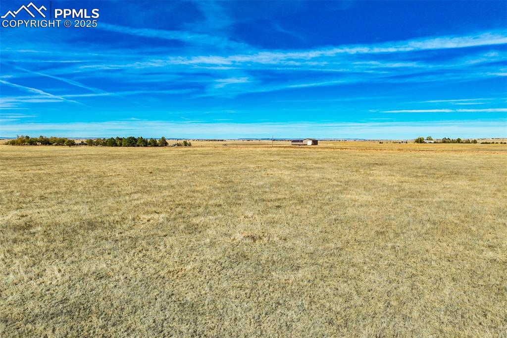 Image 14 of 20: View of yard with a view of countryside