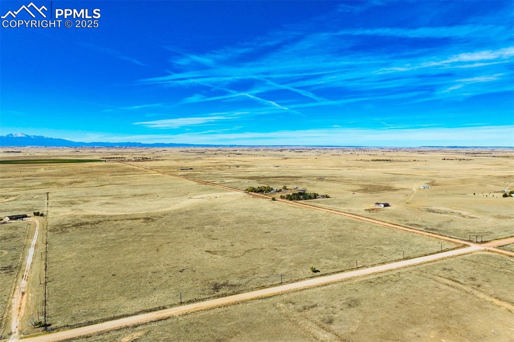 Image 20 of 20: Overview of rural landscape with mountains and a desert landscape