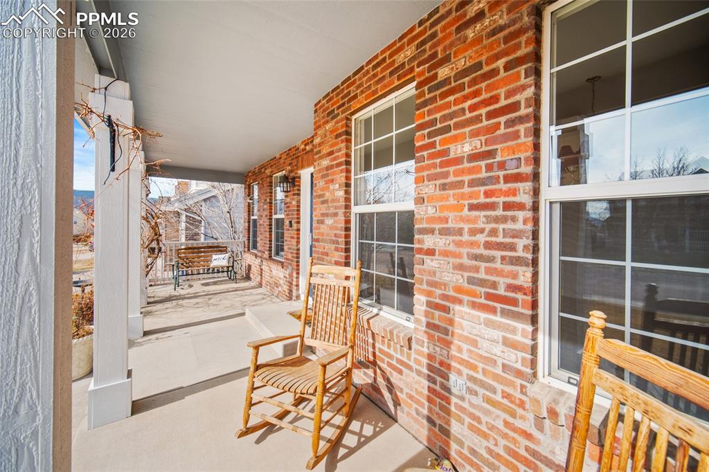 Image 2 of 29: Front Porch with Pikes Peak Views