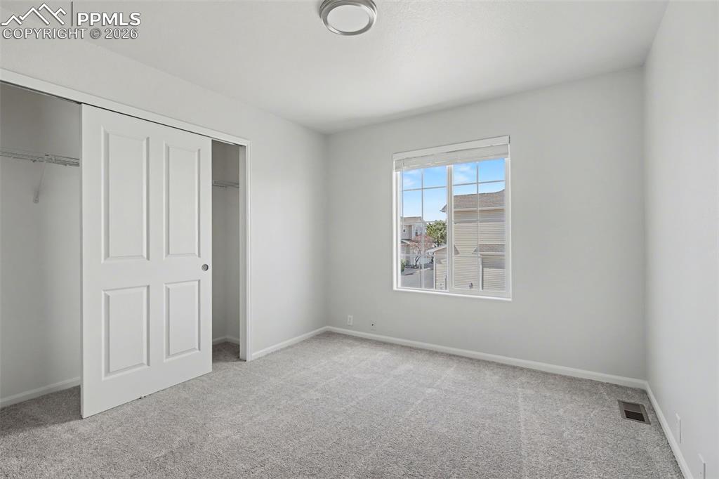 Image 21 of 28: Bedroom