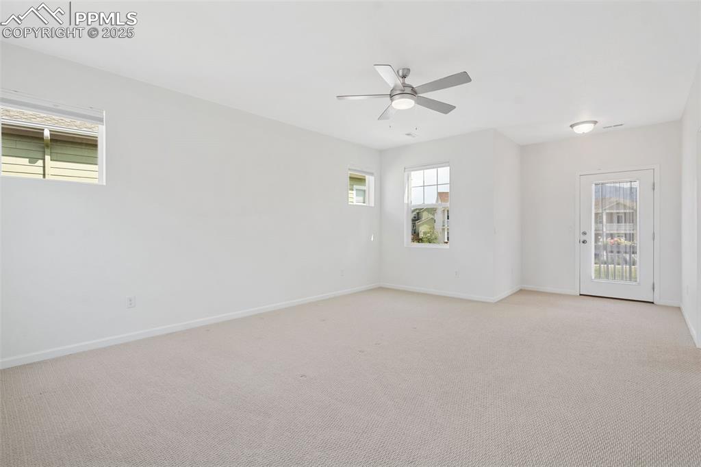 Image 14 of 42: Huge Primary Bedroom with lots of natural light