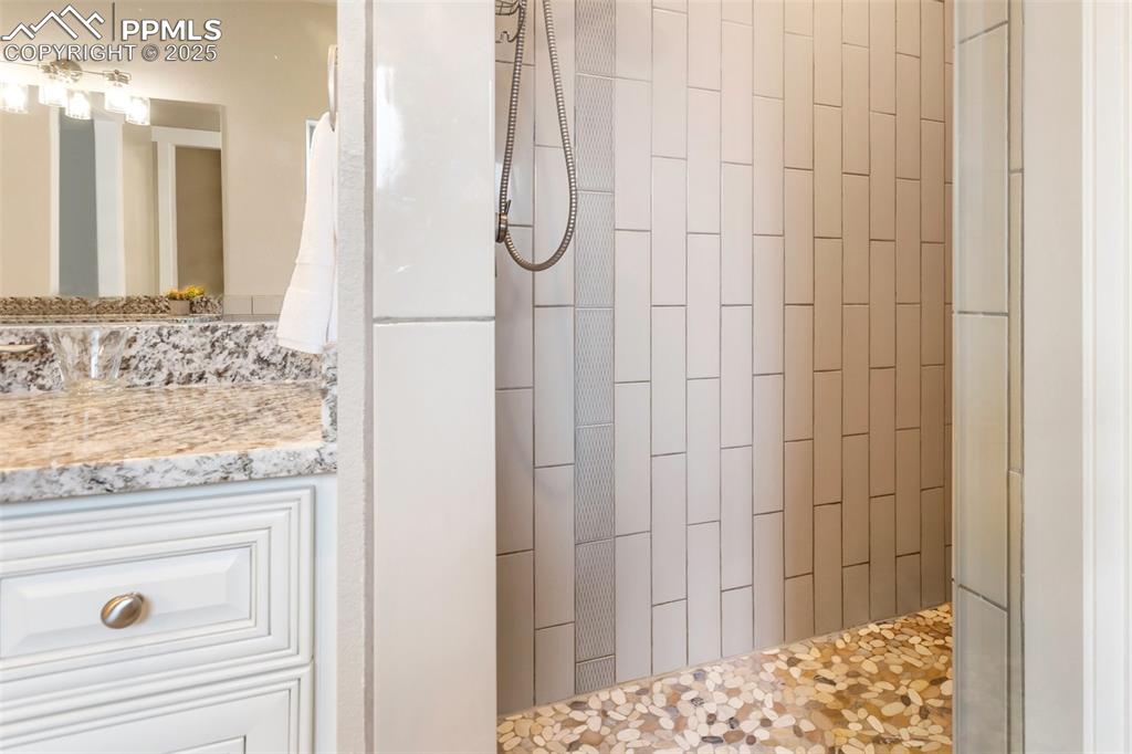 Image 19 of 44: Large tile walk in shower