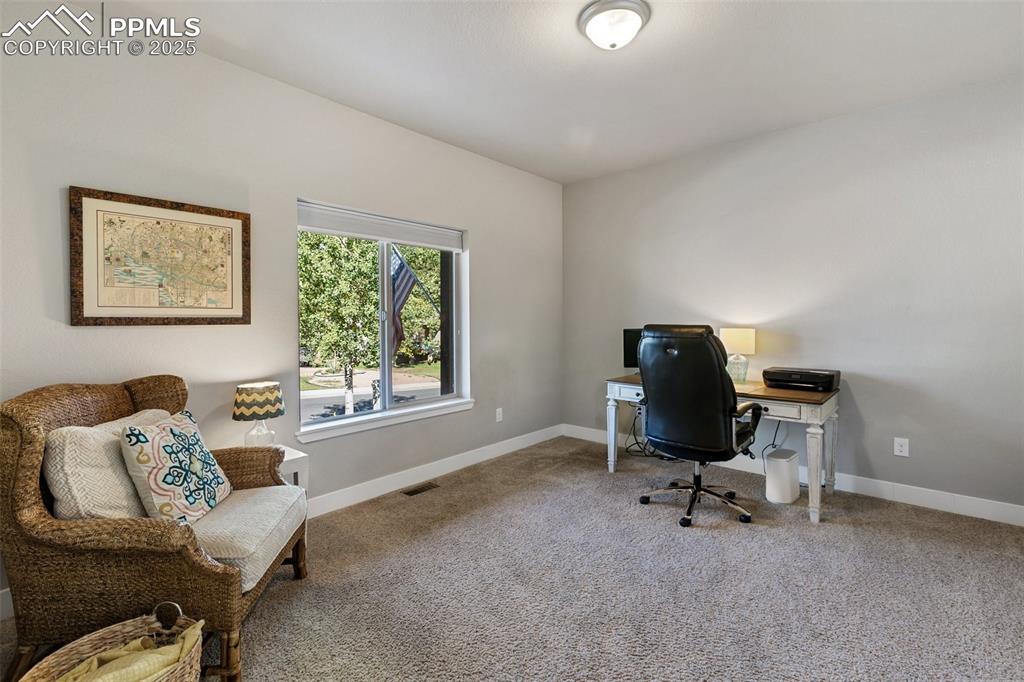 Image 22 of 44: Second main floor bedroom/office