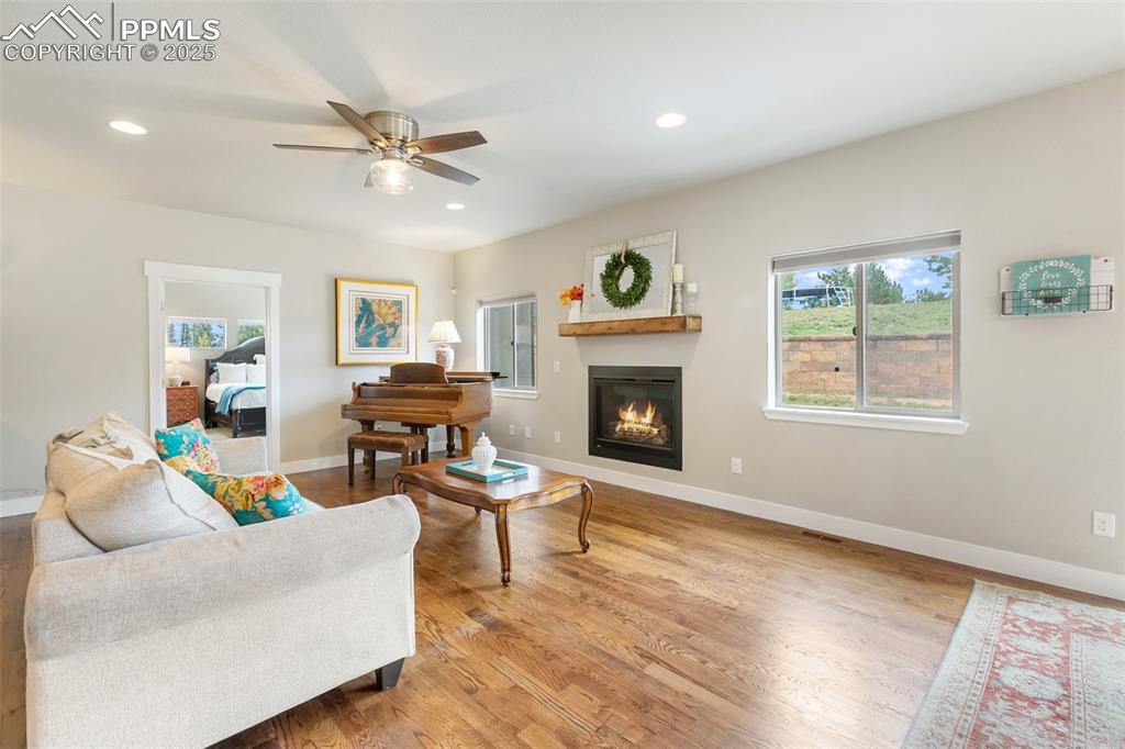 Image 5 of 44: Lovely living room space in this main floor living home.