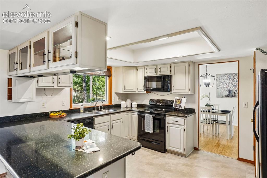 Image 12 of 48: Kitchen features quartz countertops.