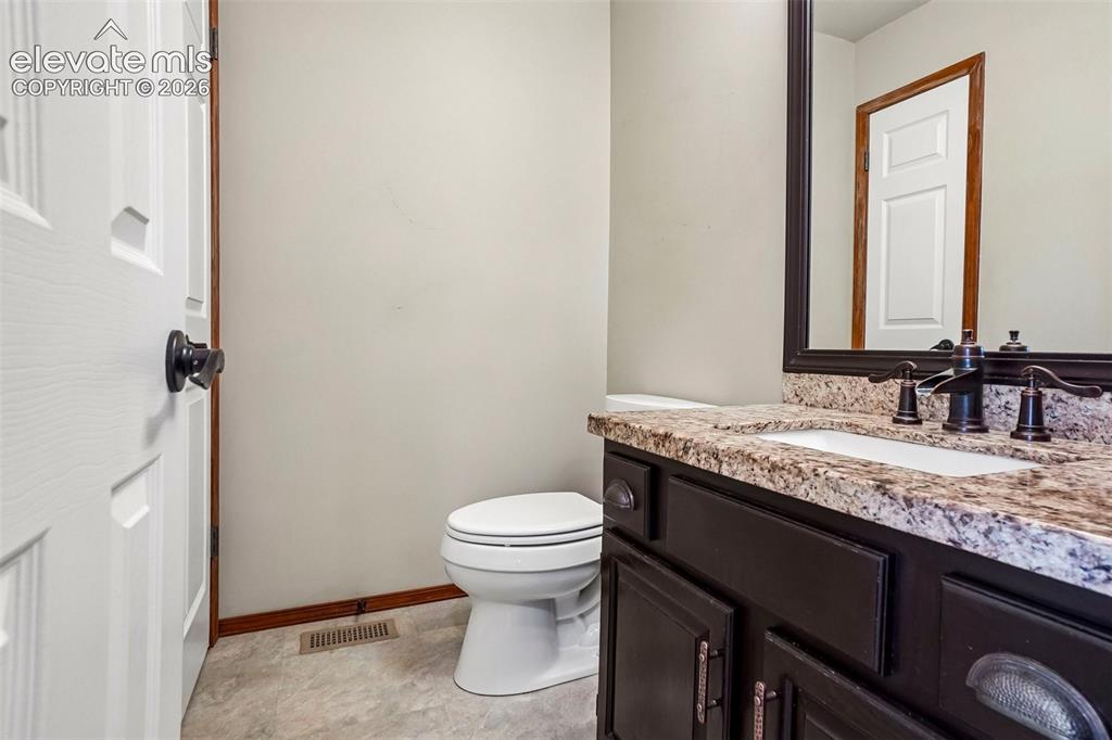 Image 18 of 48: Powder bath on the main level.