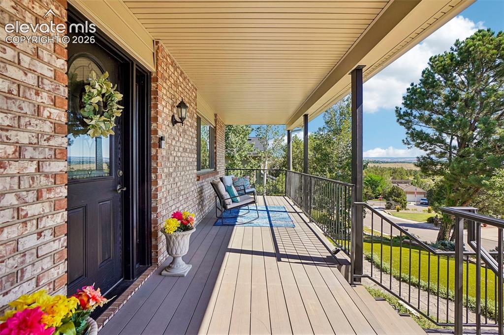 Image 3 of 48: Composite front deck gives you sweeping city views! 