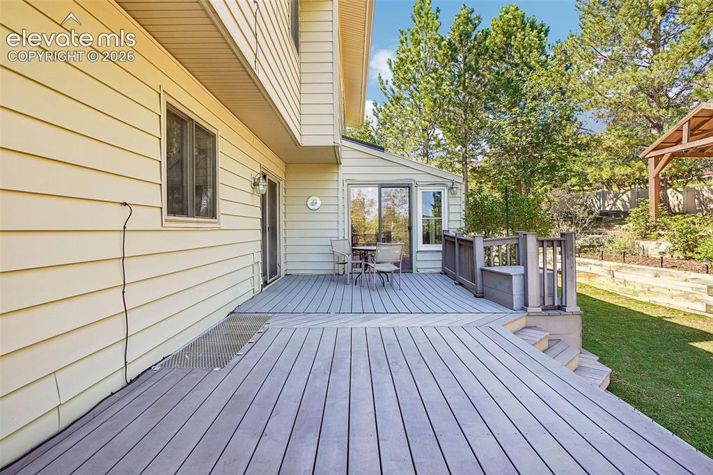 Image 36 of 48: Large back deck.