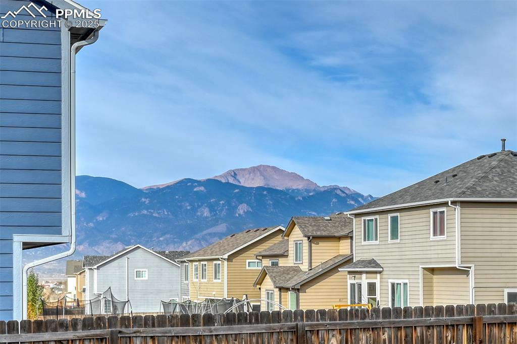 Image 44 of 45: View of mountain backdrop featuring nearby suburban area