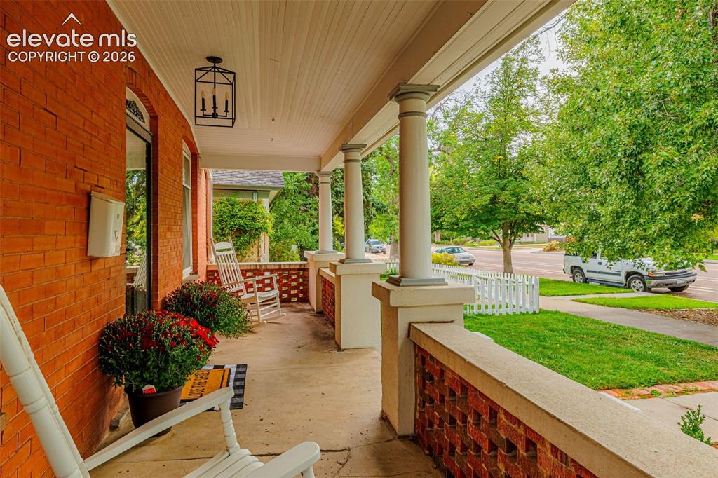 Image 3 of 49: Classic front porch