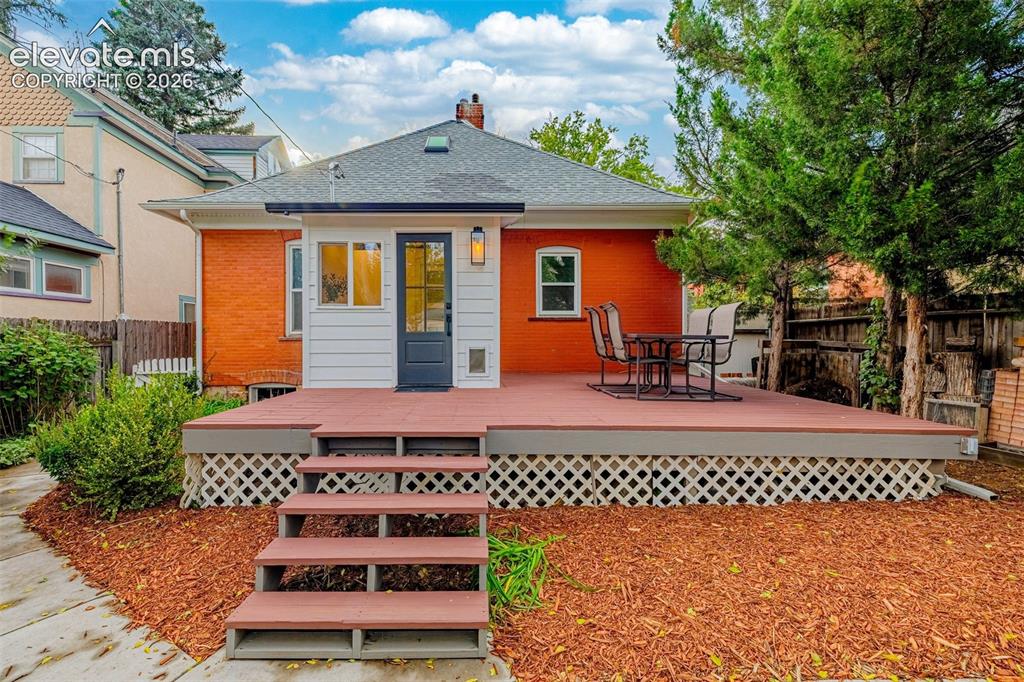 Image 40 of 49: Large back deck