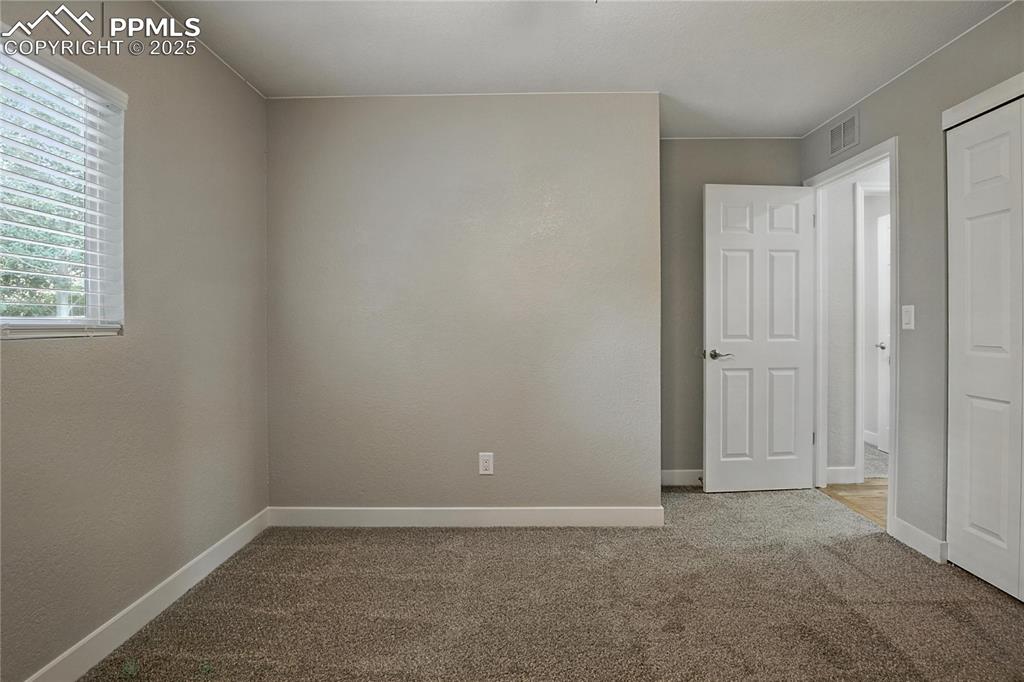 Image 15 of 38: Bedroom
