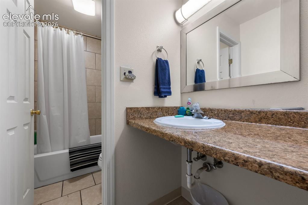 Image 25 of 50: Motel Room Bathroom