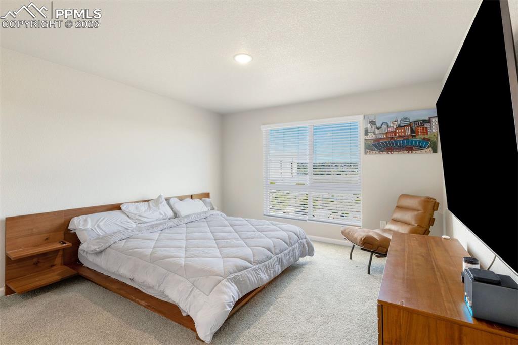 Image 14 of 24: Primary Bedroom located on the upper level