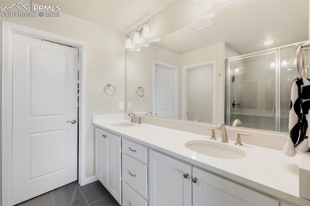 Image 16 of 24: Double vanities in Primary Bathroom